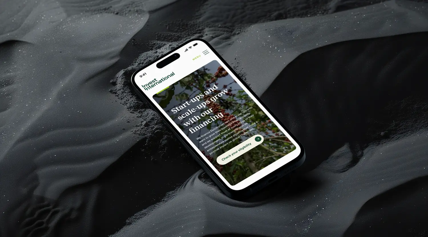 Iphones mockup with Invest International website